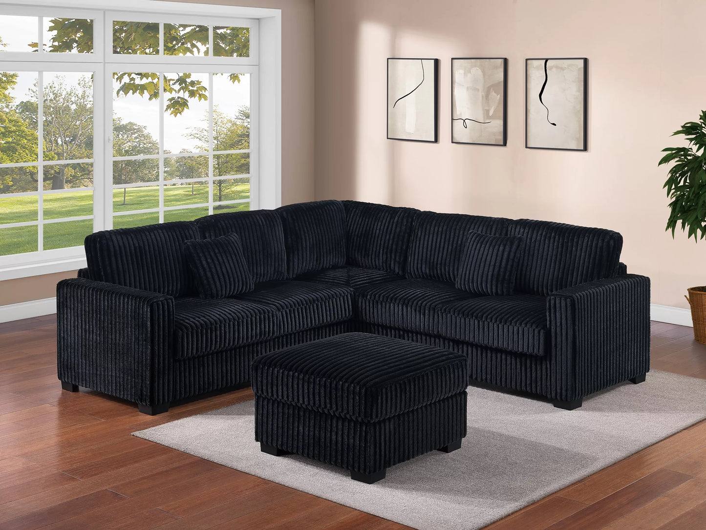 L shaped comfy black sectional and ottoman