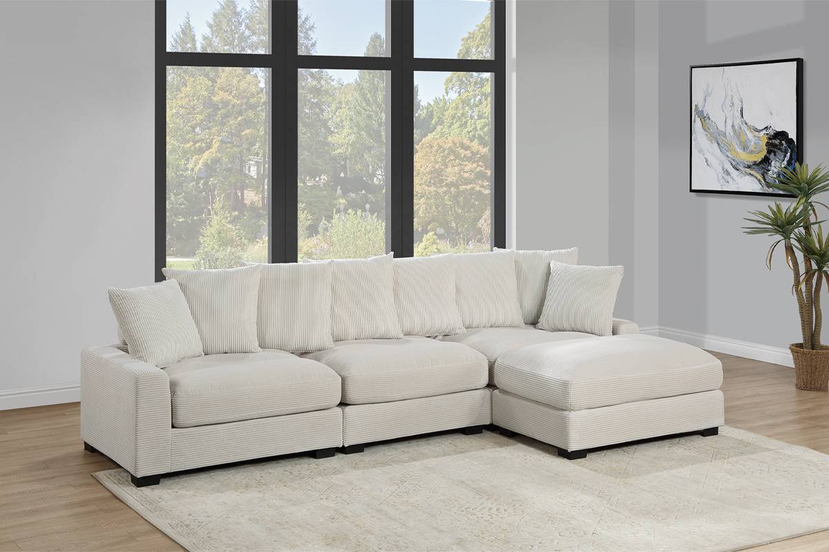 Cream sectional w/ scatterback pillows